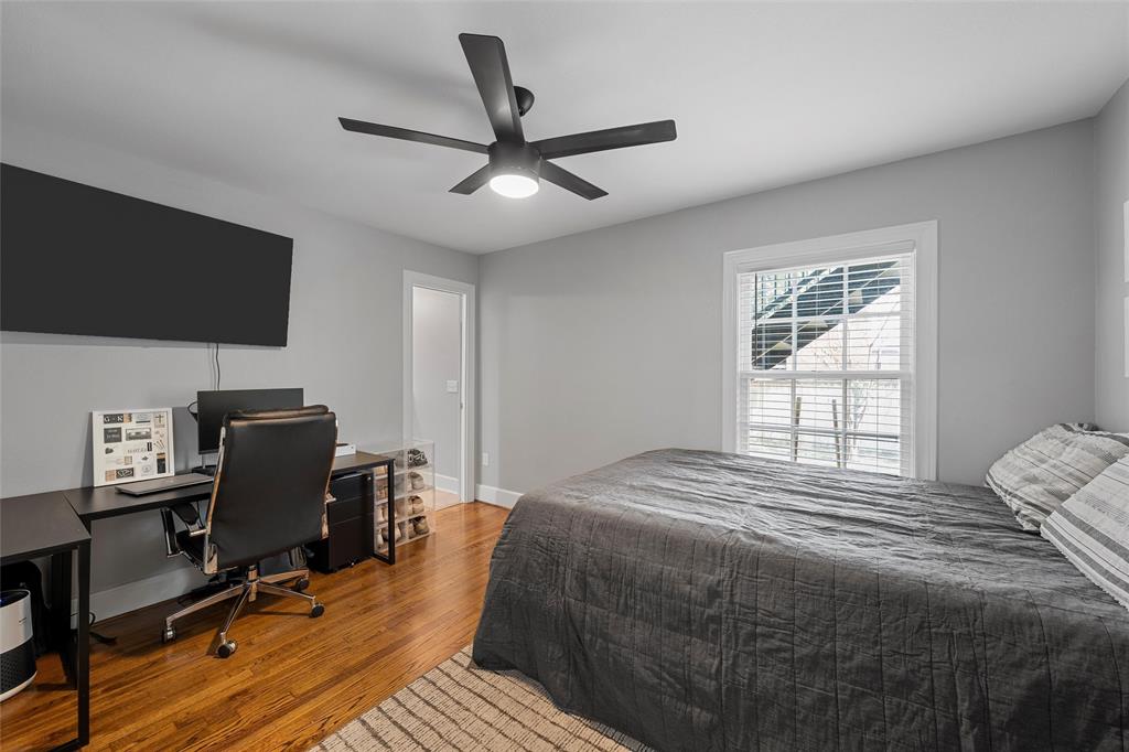 1500 South 10th Street Waco, TX 76706 - Photo 6 of 25 Bedroom featuring wood finished floors, an office area, and ceiling fan