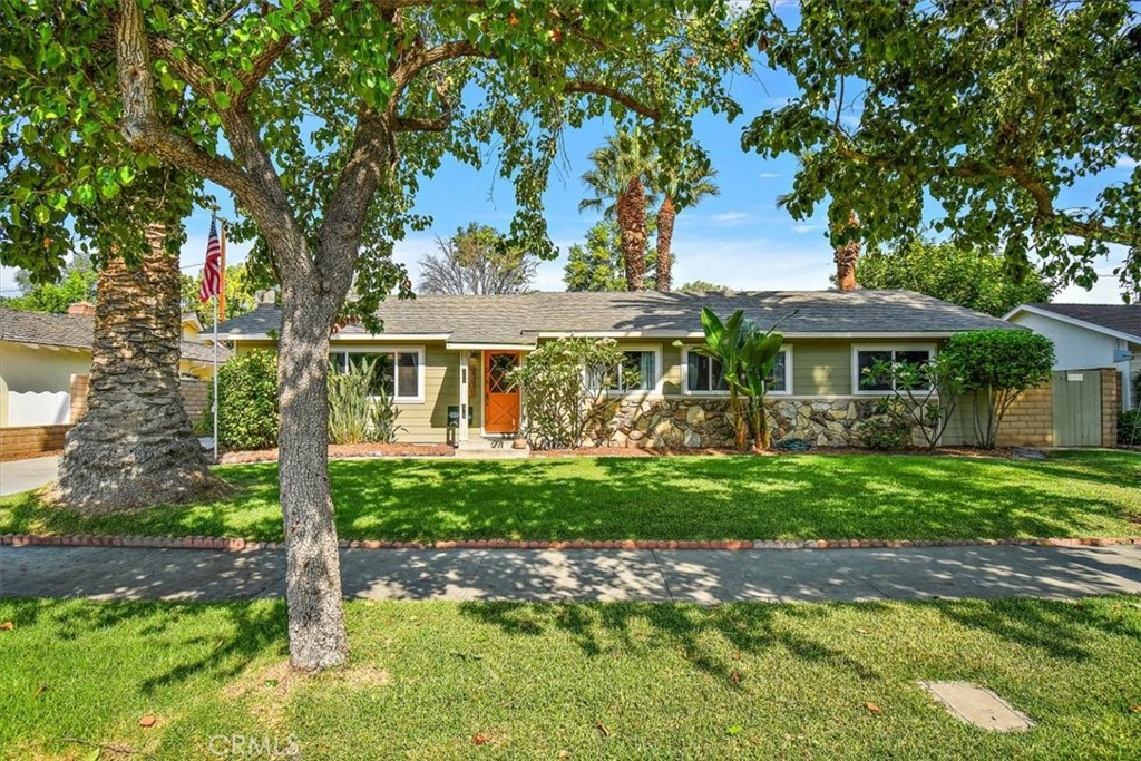 5201 Tower Road Riverside, CA 92506 - Photo 1 of 1 a front view of a house with garden