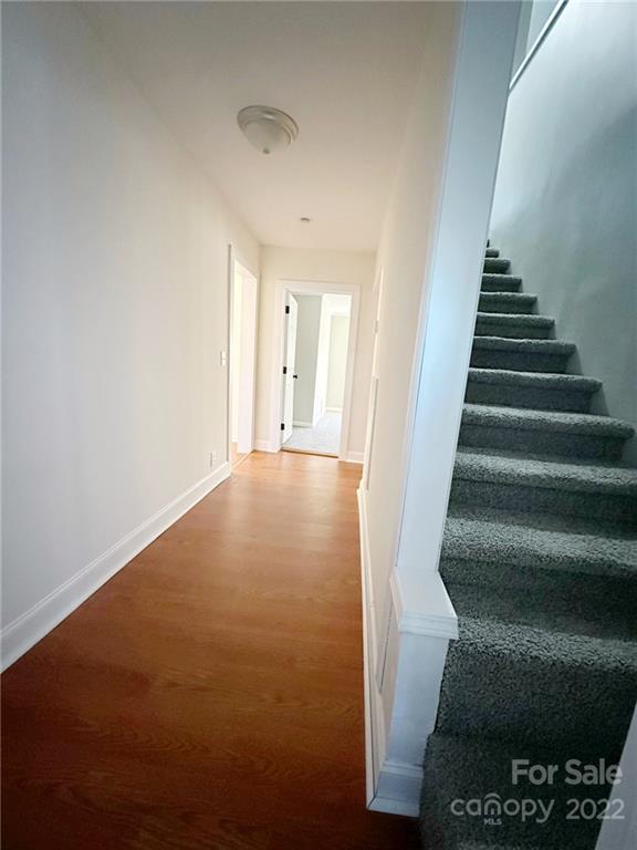 506 East Frederick Street Gaffney, SC 29340 - Photo 18 of 25 a view of an empty room with stairs