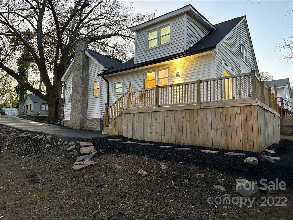 506 East Frederick Street Gaffney, SC 29340 - Photo 2 of 25 a view of a small house with backyard and sitting area
