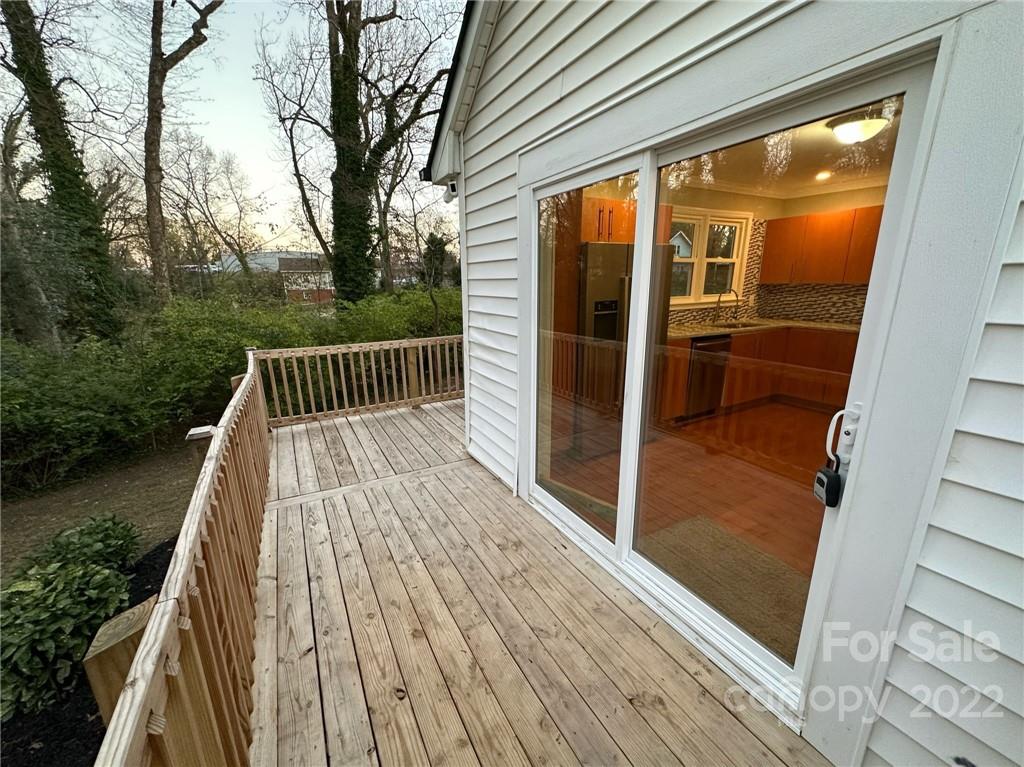 506 East Frederick Street Gaffney, SC 29340 - Photo 24 of 25 a view of balcony with floor to ceiling window and wooden floor
