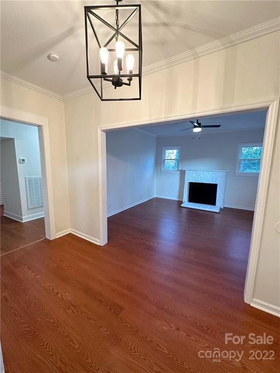 506 East Frederick Street Gaffney, SC 29340 - Photo 6 of 25 a view of empty room with wooden floor and fan