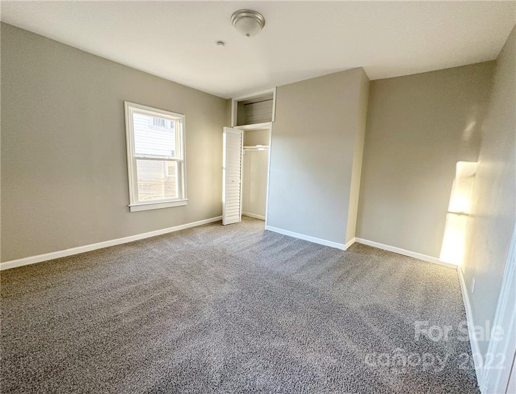 506 East Frederick Street Gaffney, SC 29340 - Photo 8 of 25 a view of an empty room with a window