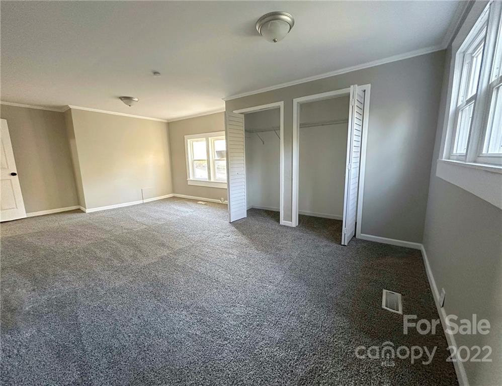 506 East Frederick Street Gaffney, SC 29340 - Photo 9 of 25 a view of an empty room with a window
