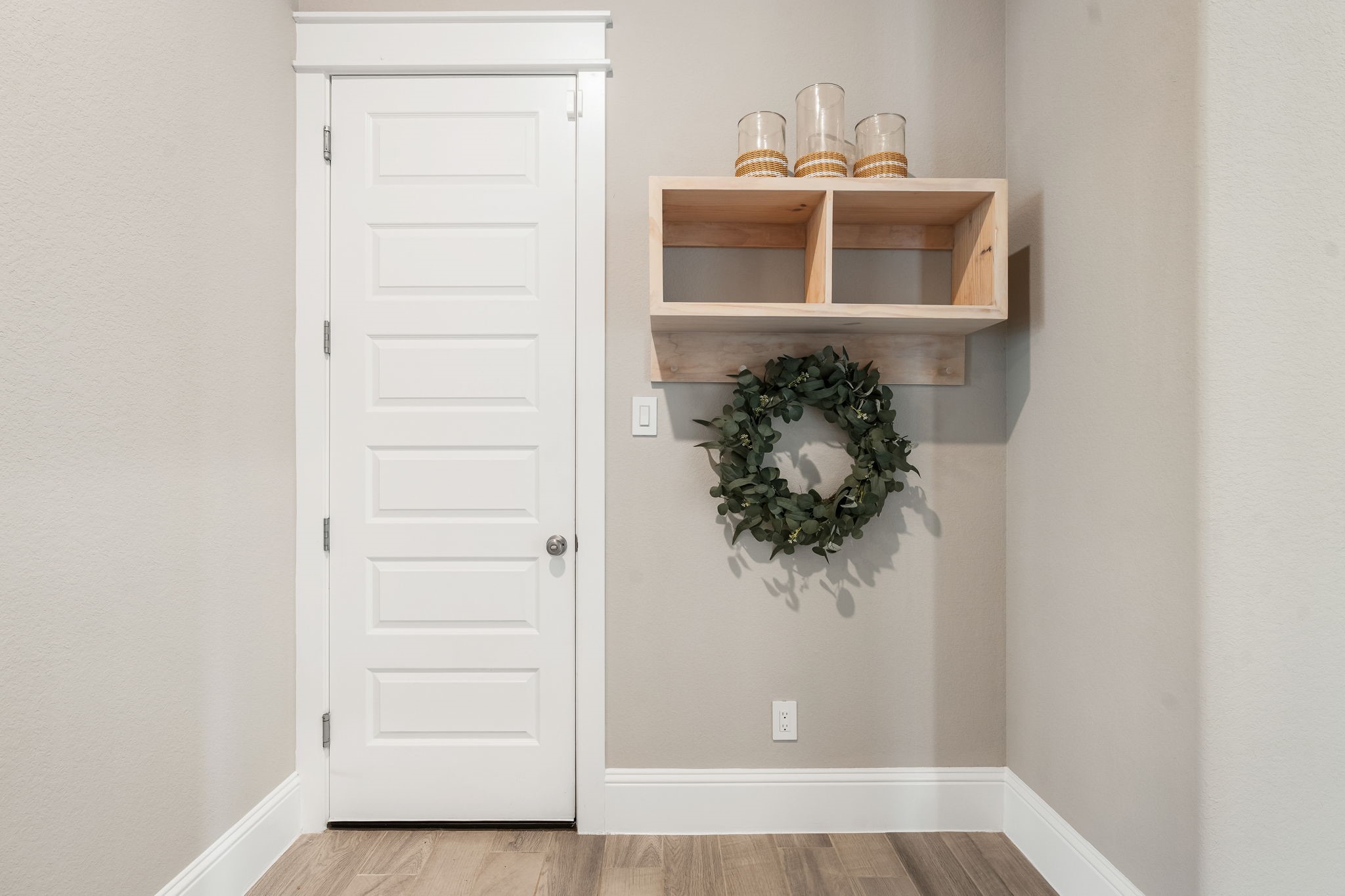 2206 Rope Maker Road Conroe, TX 77384 - Photo 12 of 42 Functional mudroom drop zone near utility and laundry area.