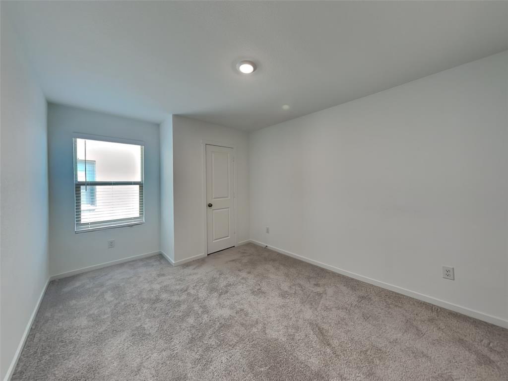 4229 Brindley Road Little Elm, TX 75068 - Photo 12 of 15 an empty room with windows