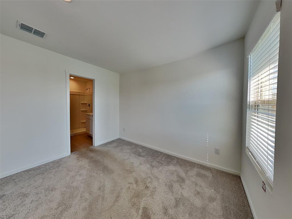 4229 Brindley Road Little Elm, TX 75068 - Photo 5 of 15 an empty room with windows