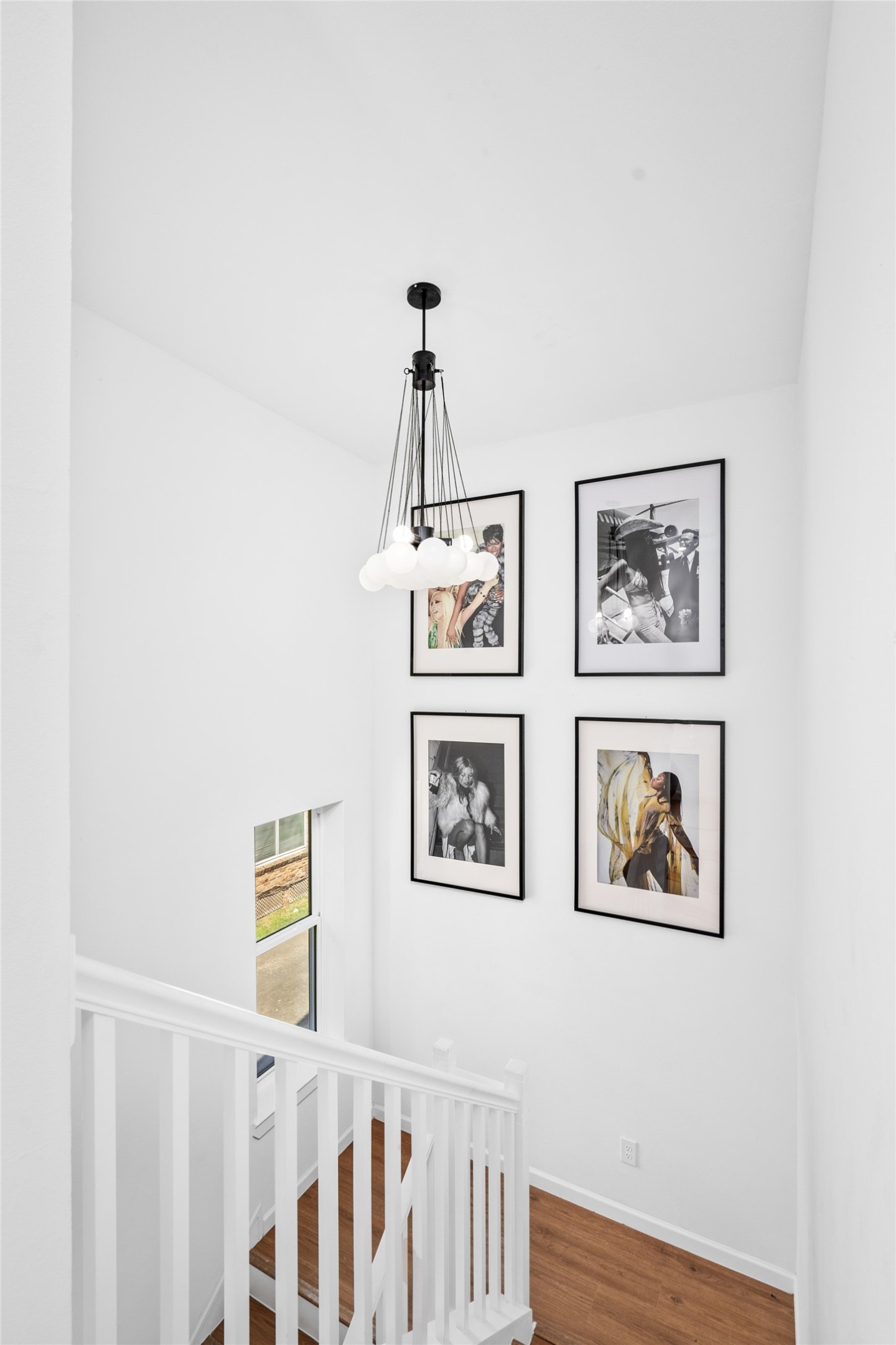 2901 Cleburne Street Houston, TX 77004 - Photo 28 of 50 a view of a hallway with paintings on the wall