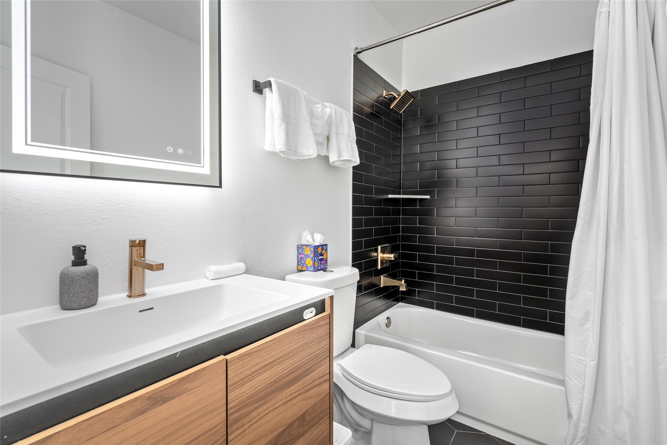 2901 Cleburne Street Houston, TX 77004 - Photo 42 of 50 a bathroom with a sink a toilet and shower