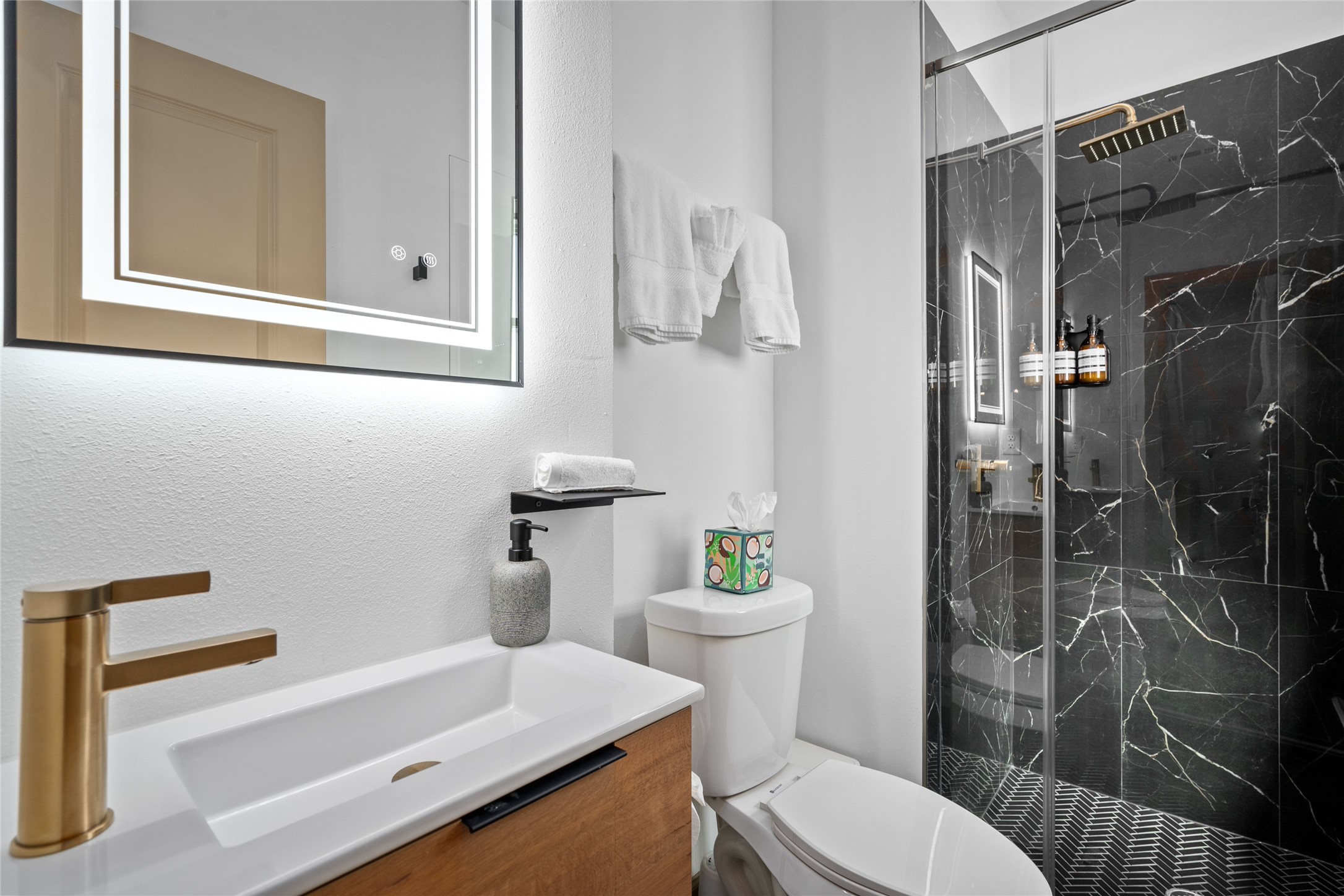 2901 Cleburne Street Houston, TX 77004 - Photo 44 of 50 a bathroom with a sink a toilet and shower