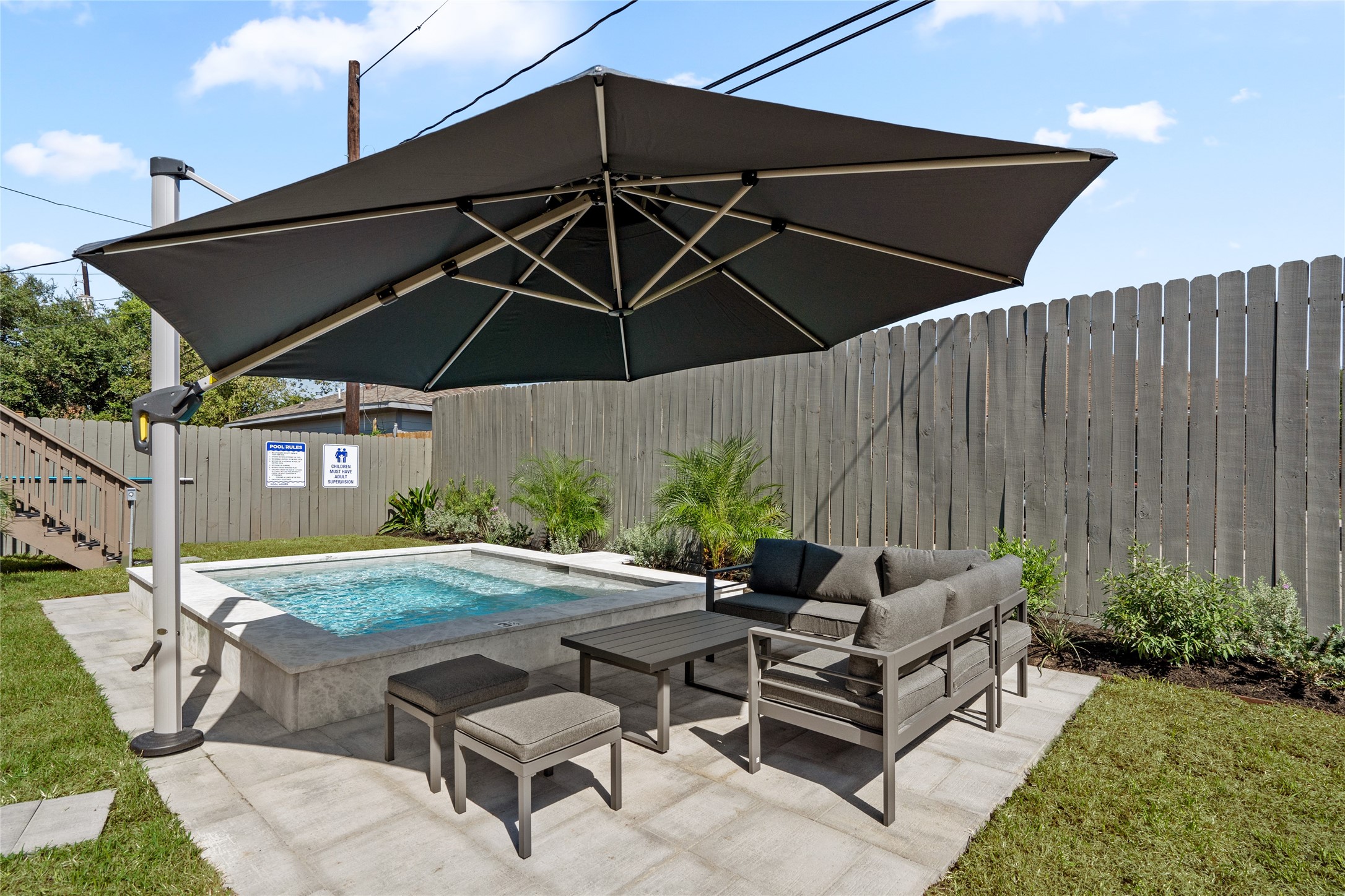 2901 Cleburne Street Houston, TX 77004 - Photo 48 of 50 a patio with a patio table and chairs