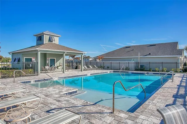 a front view of house with outdoor seating