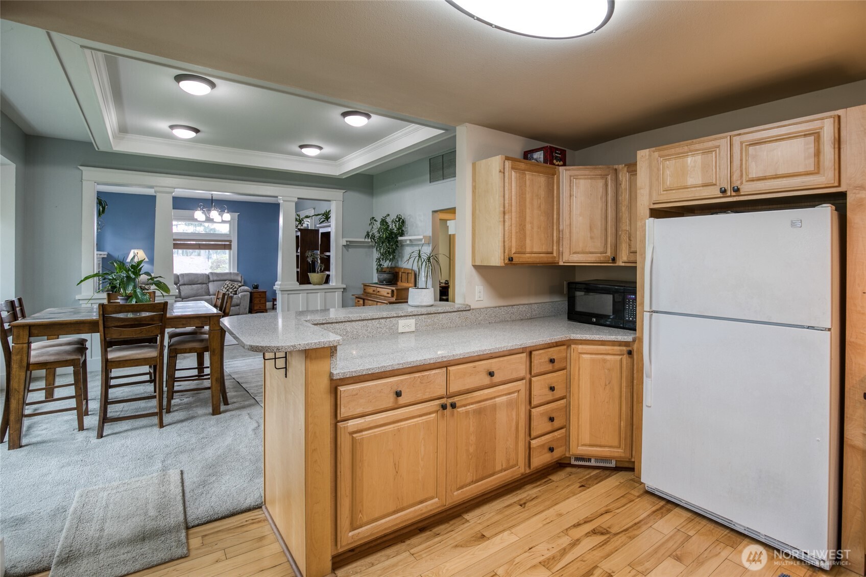 722 7th Avenue Aberdeen, WA 98520 - Photo 14 of 38 a kitchen with sink refrigerator and cabinets