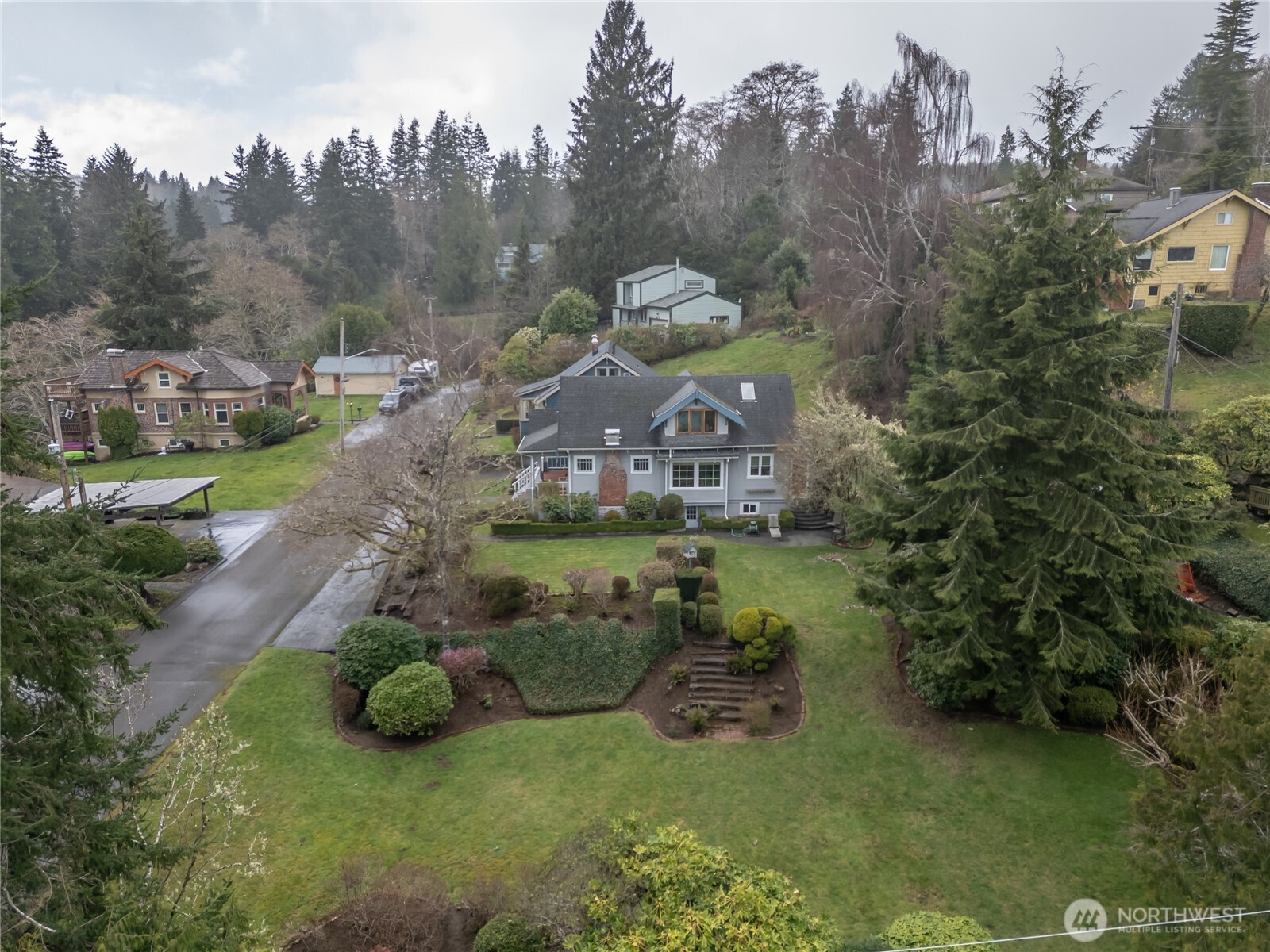 722 7th Avenue Aberdeen, WA 98520 - Photo 38 of 38 a aerial view of a house with garden space and street view