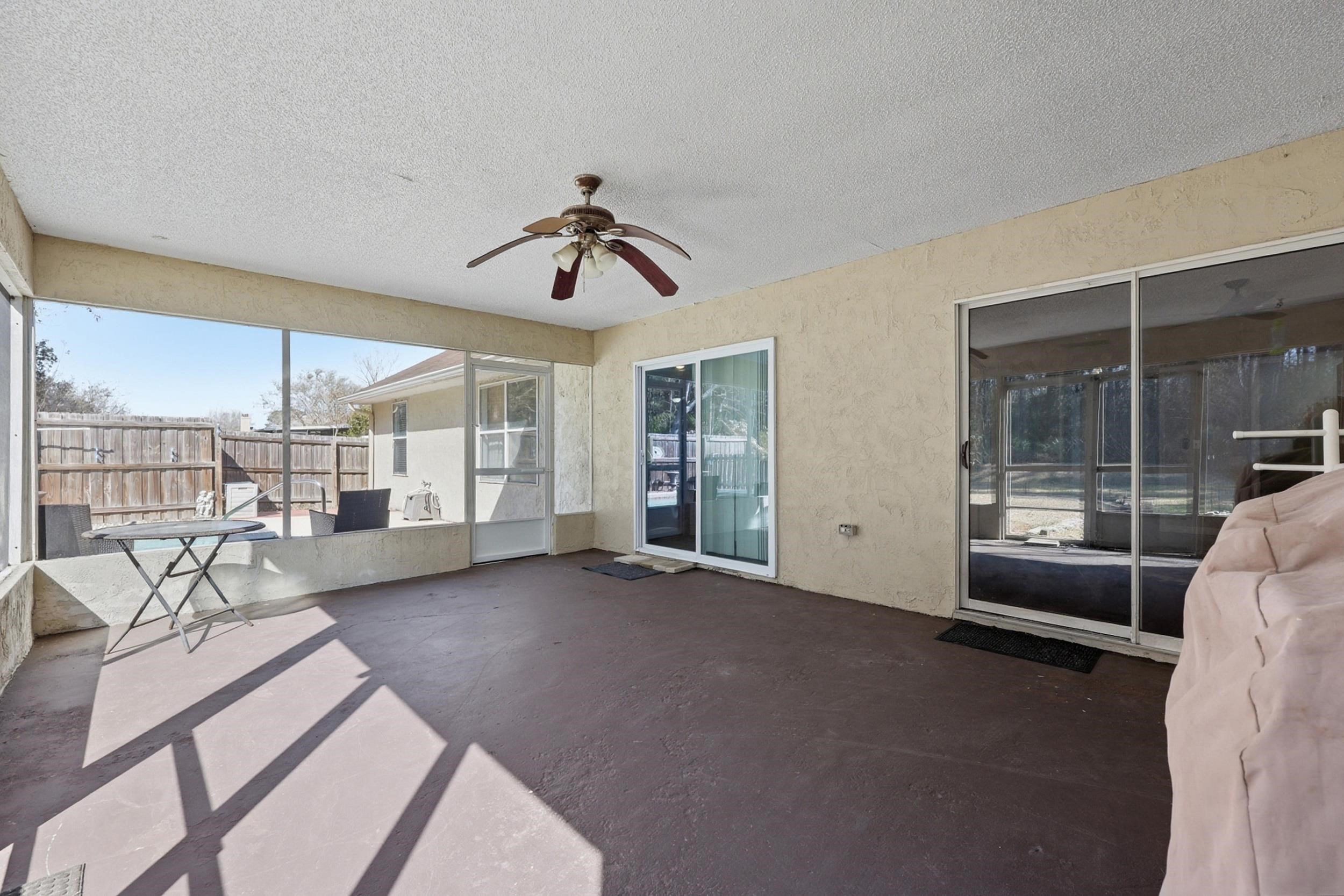 5296 Timucua Circle St. Augustine, FL 32086 - Photo 38 of 65 a view of a livingroom with furniture and windows