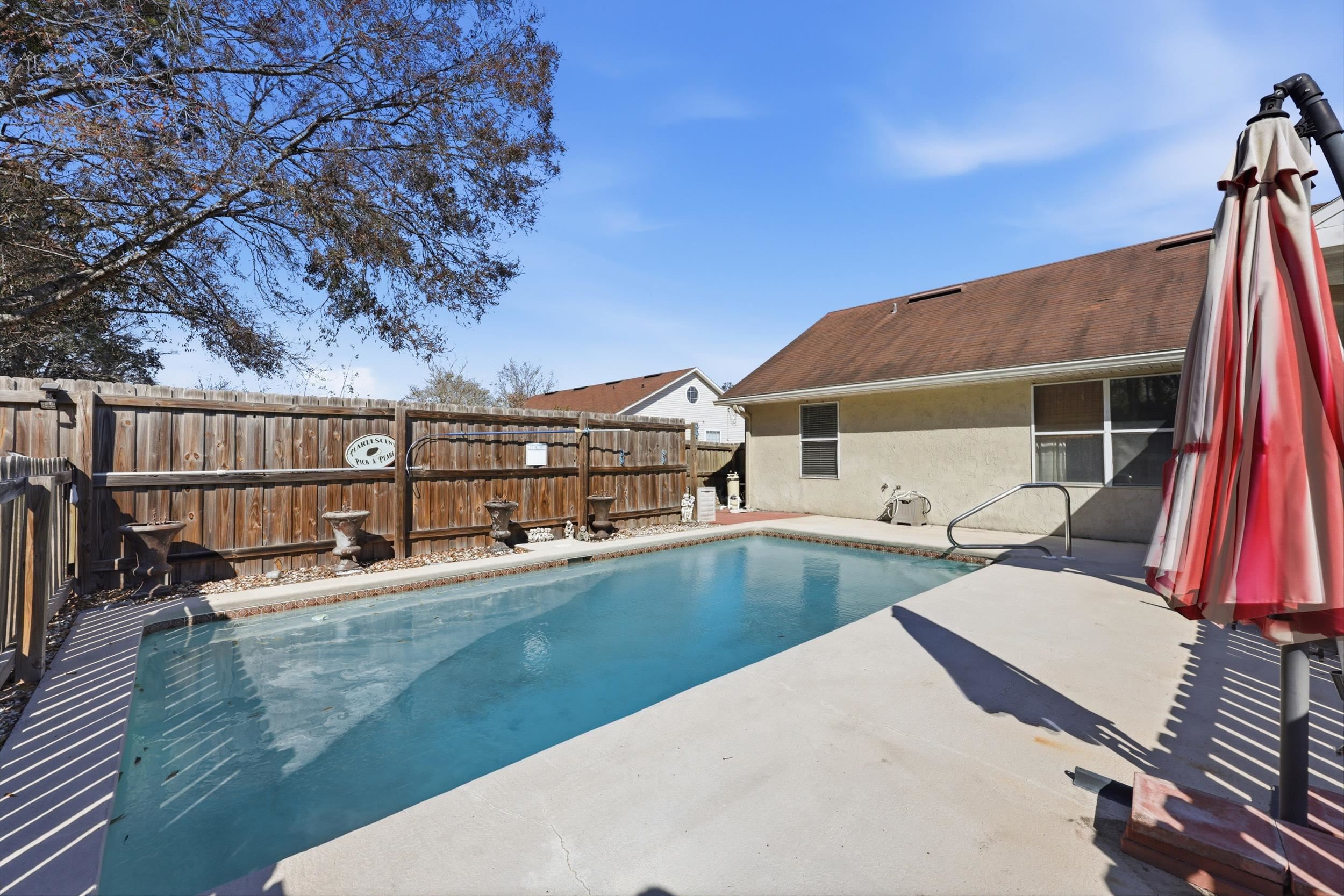 5296 Timucua Circle St. Augustine, FL 32086 - Photo 41 of 65 View of swimming pool featuring a fenced backyard and patio surround