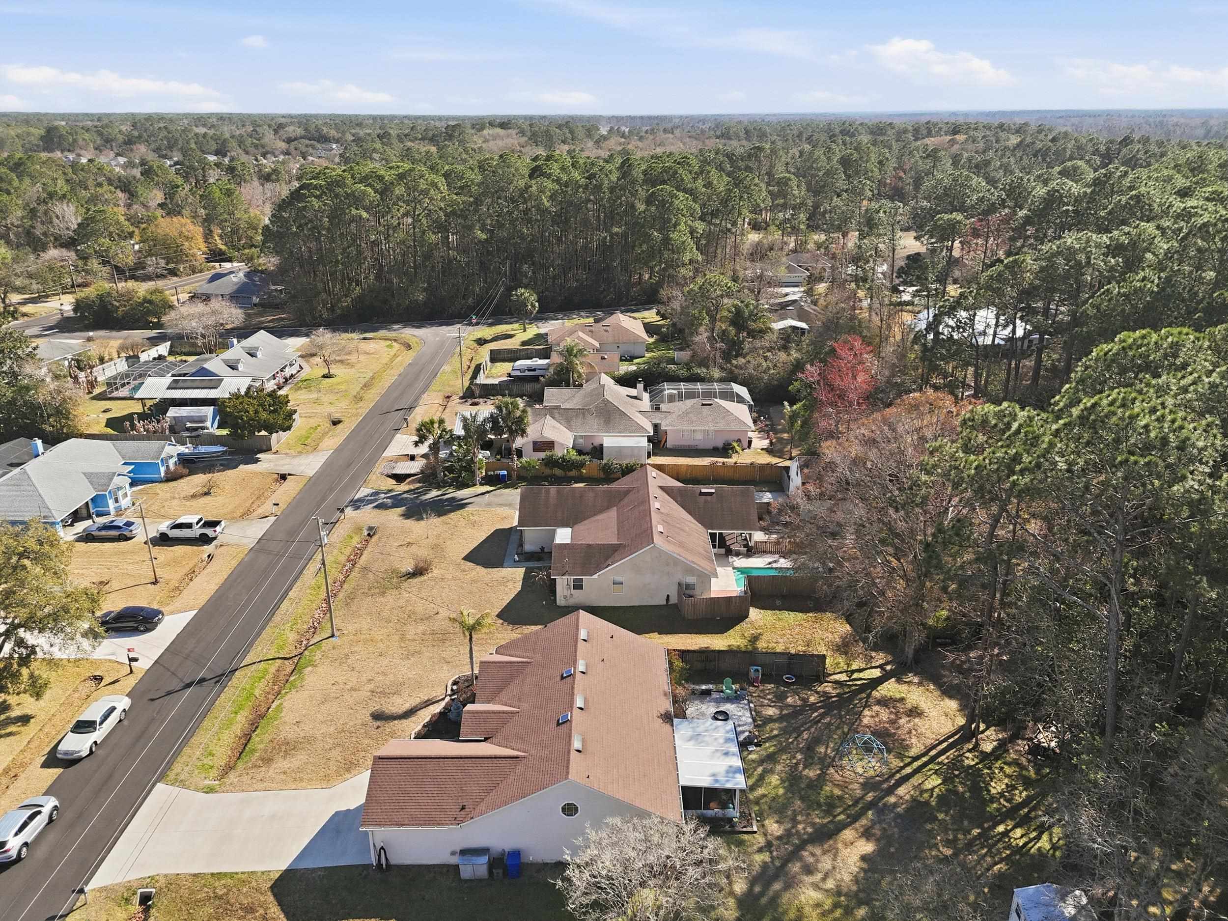 5296 Timucua Circle St. Augustine, FL 32086 - Photo 55 of 65 Aerial view of property and surrounding area featuring nearby suburban area