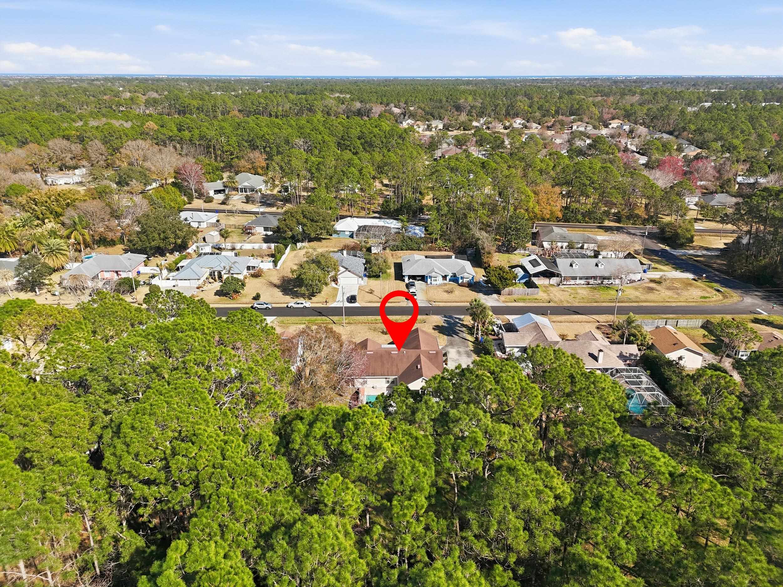 5296 Timucua Circle St. Augustine, FL 32086 - Photo 57 of 65 Aerial view of residential area featuring a forest