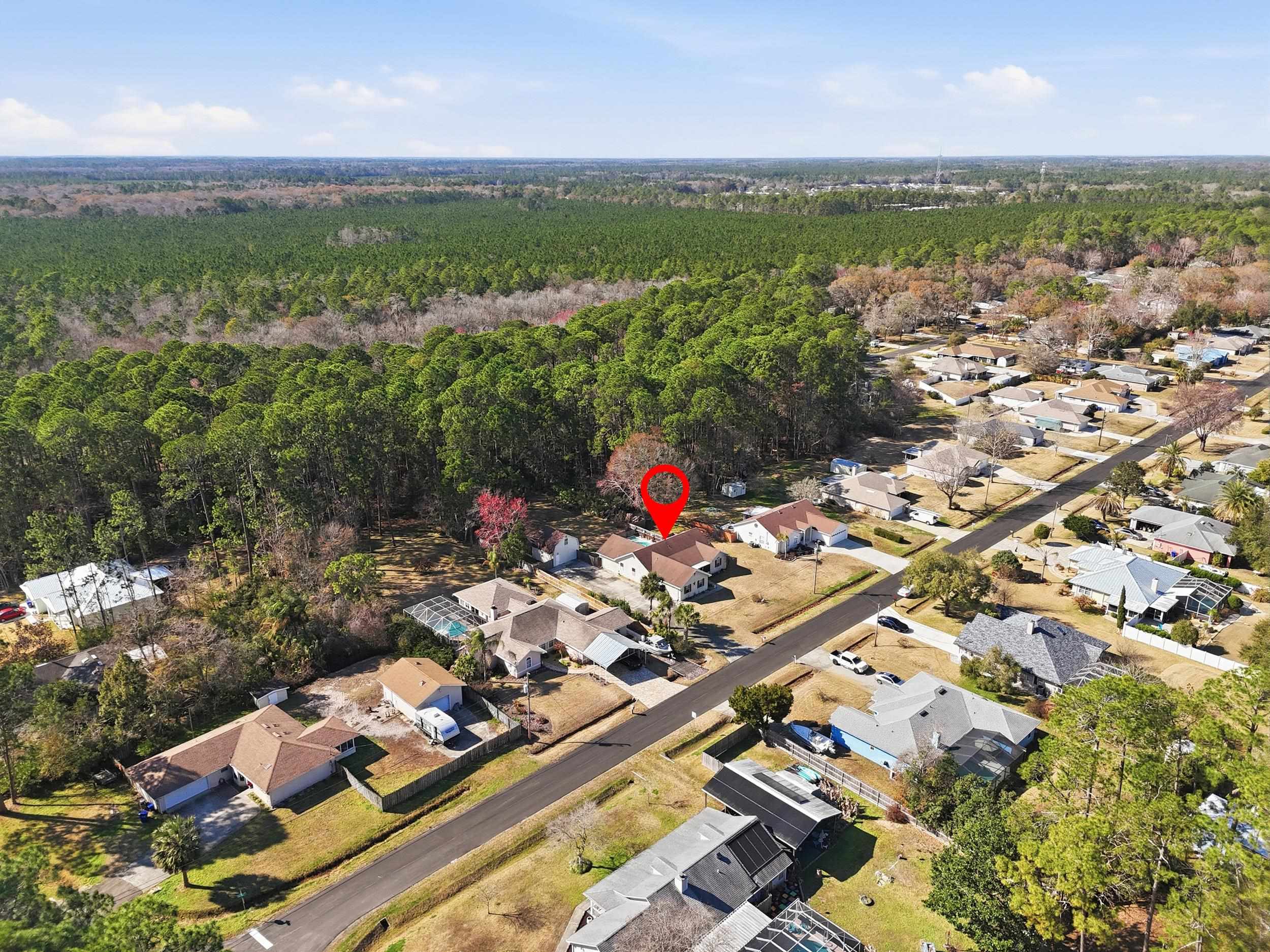 5296 Timucua Circle St. Augustine, FL 32086 - Photo 59 of 65 an aerial view of a city with lots of residential buildings ocean and mountain view in back
