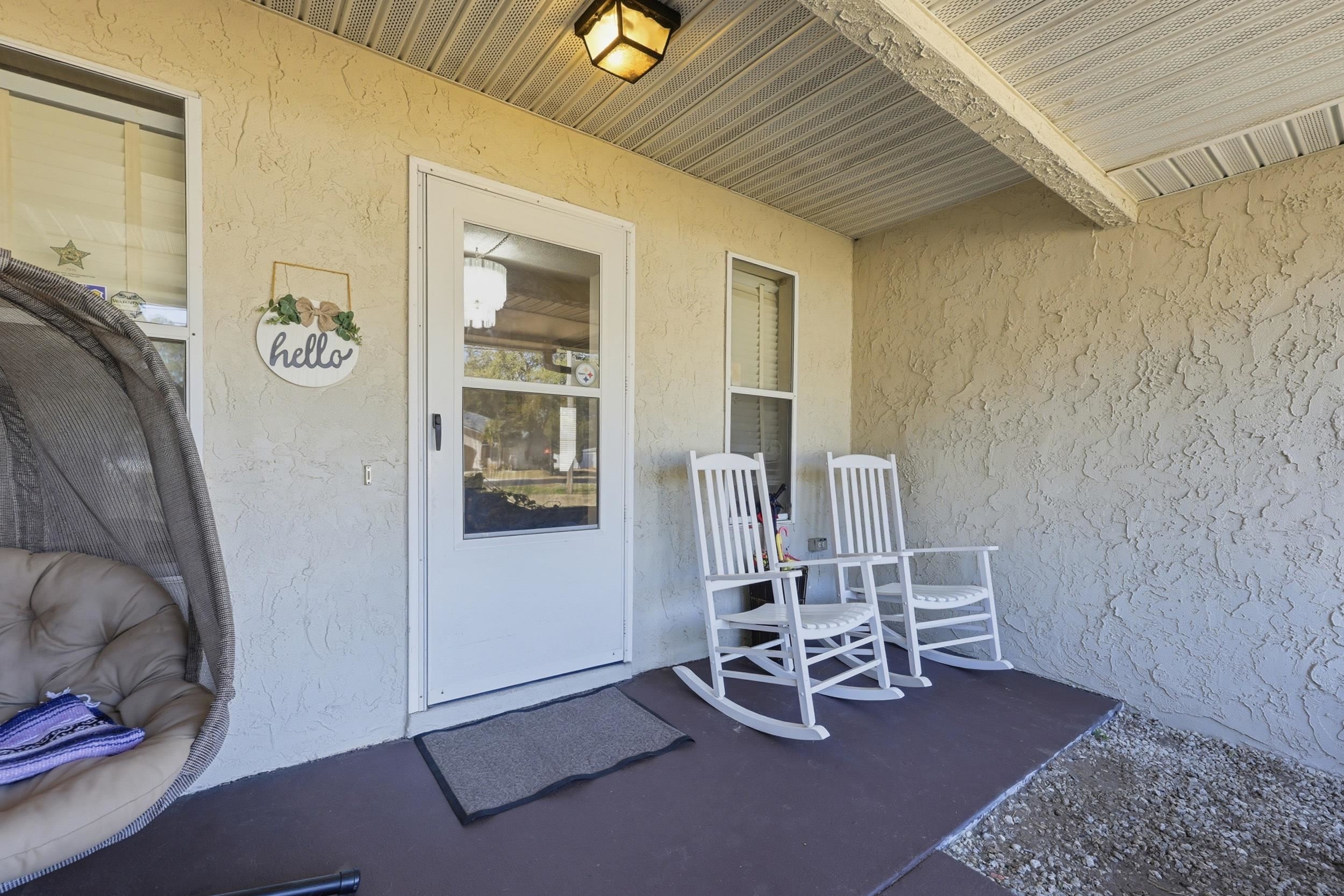 5296 Timucua Circle St. Augustine, FL 32086 - Photo 6 of 65 Property entrance featuring stucco siding