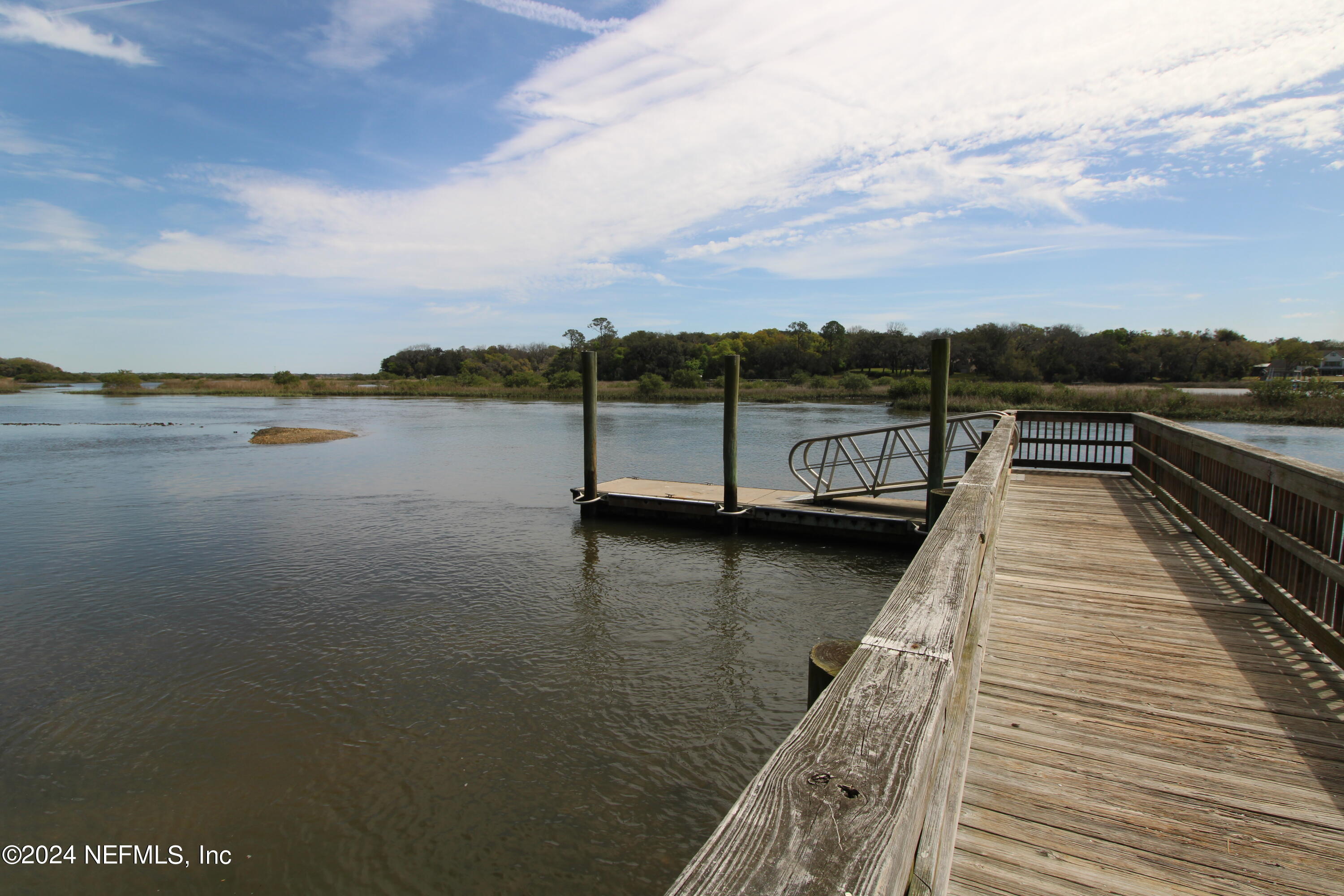 1004 Queen Road St. Augustine, FL 32086 - Photo 42 of 49 a view of a lake with a large bridge