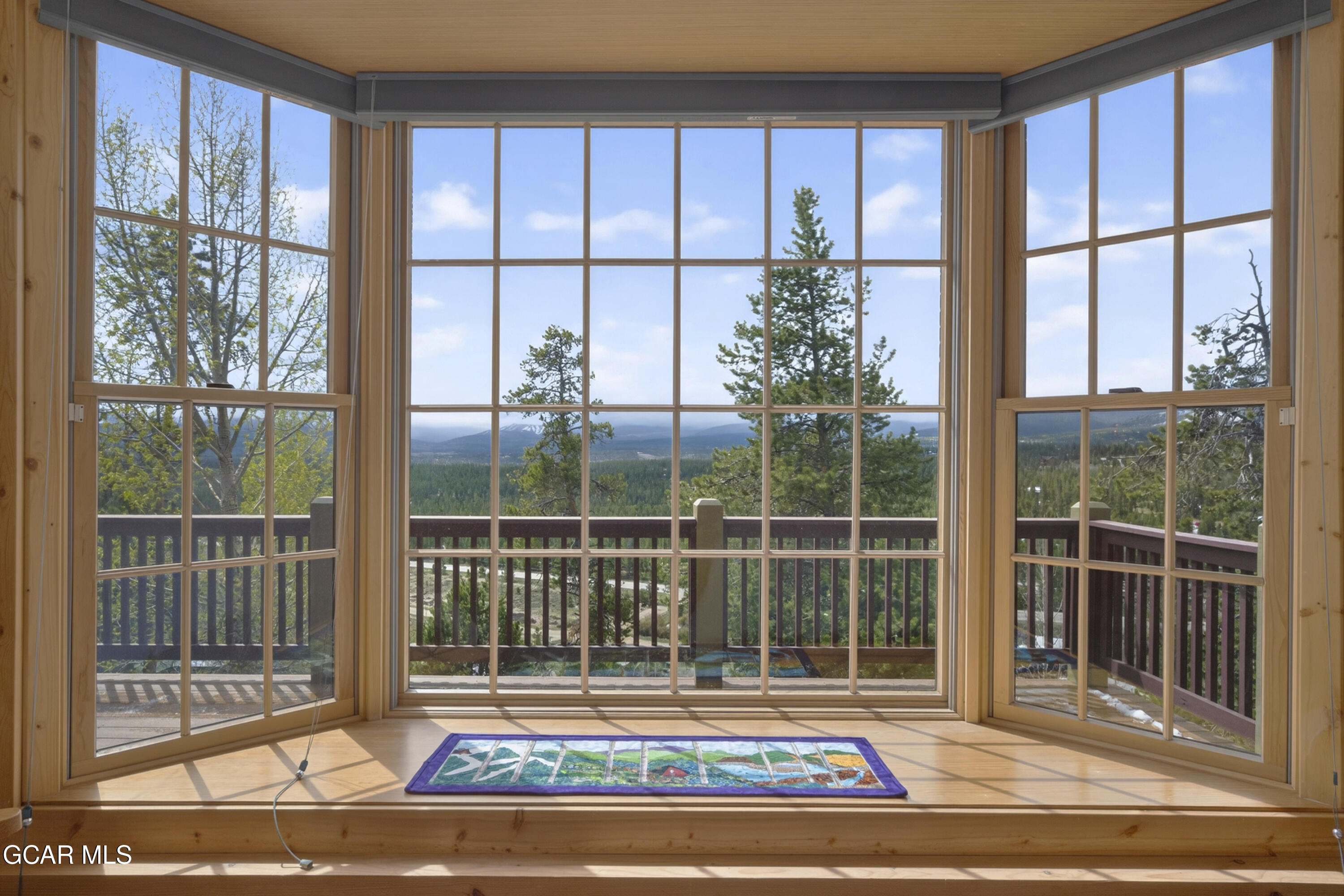 400 Ridge Road Tabernash, CO 80478 - Photo 18 of 50 a view of a glass door with a glass door