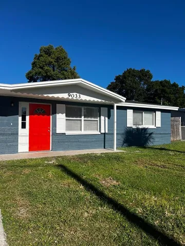 a house with garden in front of it