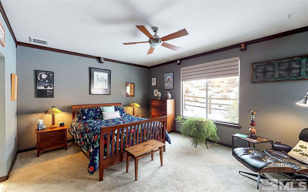 1270 Wakefield Trail Reno, NV 89523 - Photo 10 of 19 a bedroom with furniture and a window