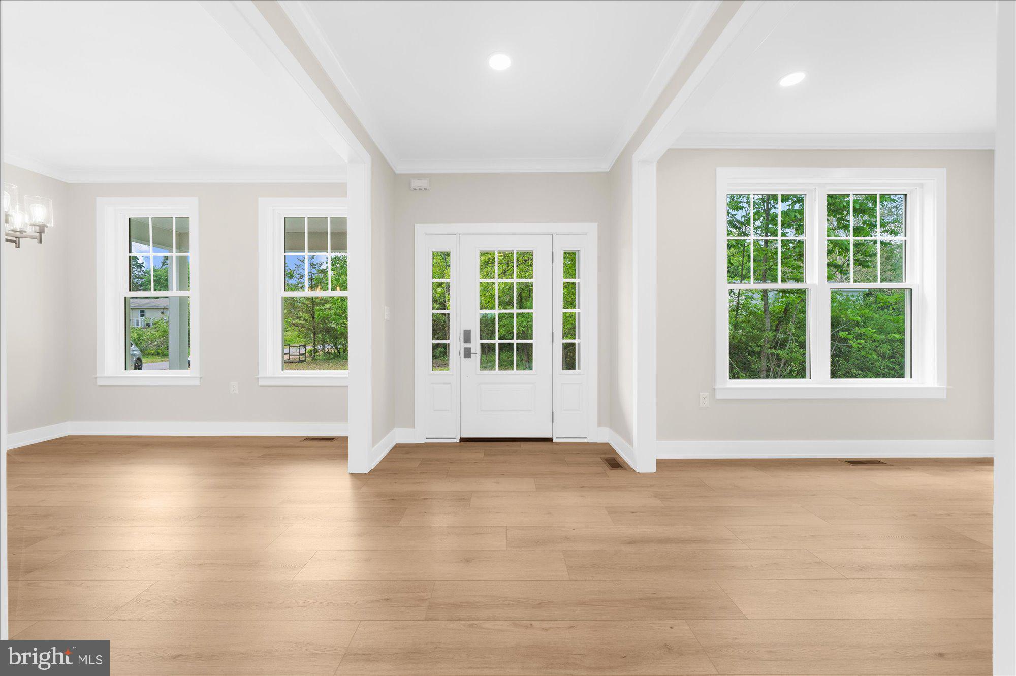 394 Renninger Road Perkiomenville, PA 18074 - Photo 11 of 41 an empty room with wooden floor and windows