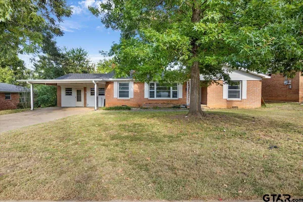 front view of house with a yard