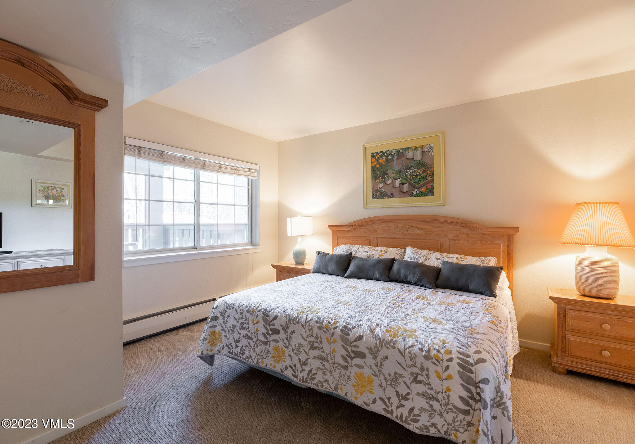 9 Vail Road, Unit 2D Vail, CO 81657 - Photo 6 of 11 a bedroom with a bed and window