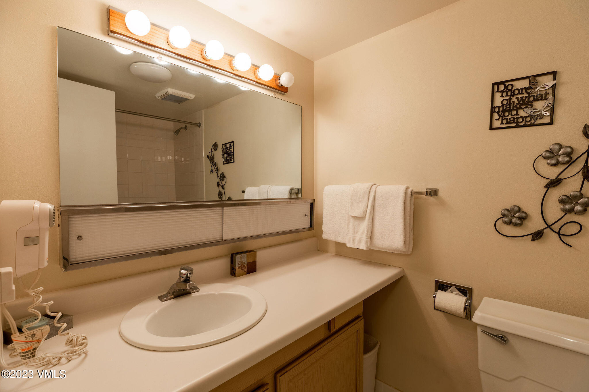 9 Vail Road, Unit 2D Vail, CO 81657 - Photo 7 of 11 a bathroom with a sink and a toilet
