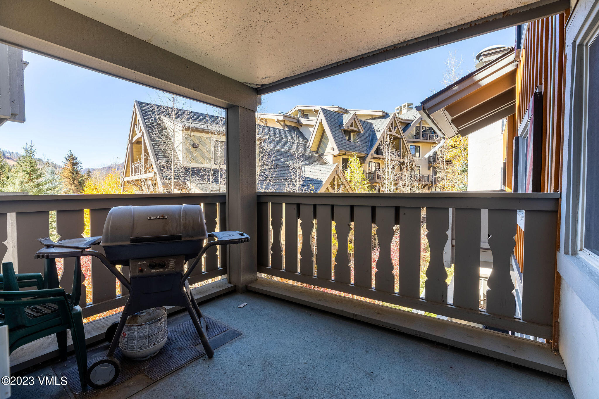 9 Vail Road, Unit 2D Vail, CO 81657 - Photo 10 of 11 a view of a chairs and table in a room