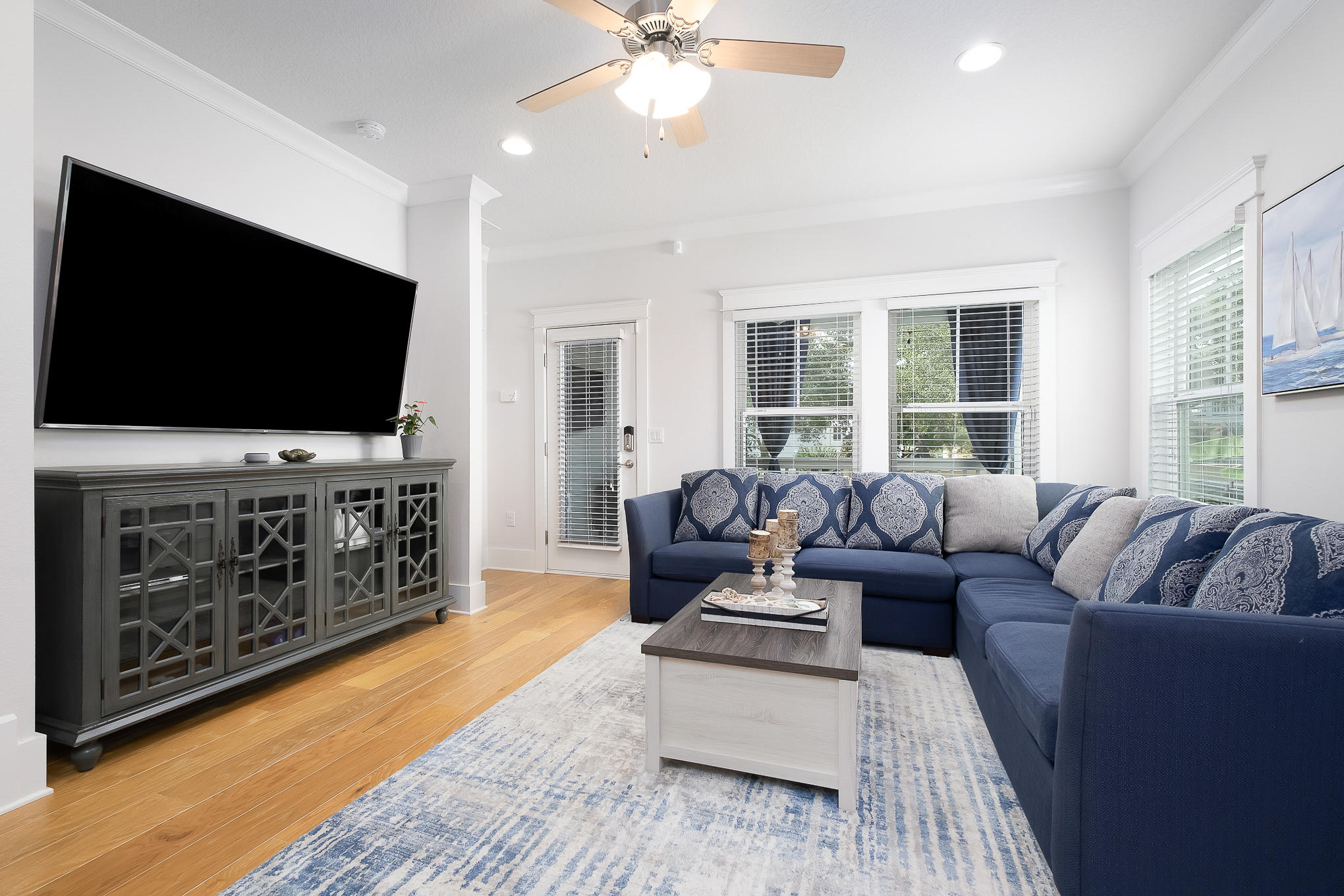 386 Grande Pointe Circle Inlet Beach, FL 32461 - Photo 11 of 50 a living room with furniture and a flat screen tv
