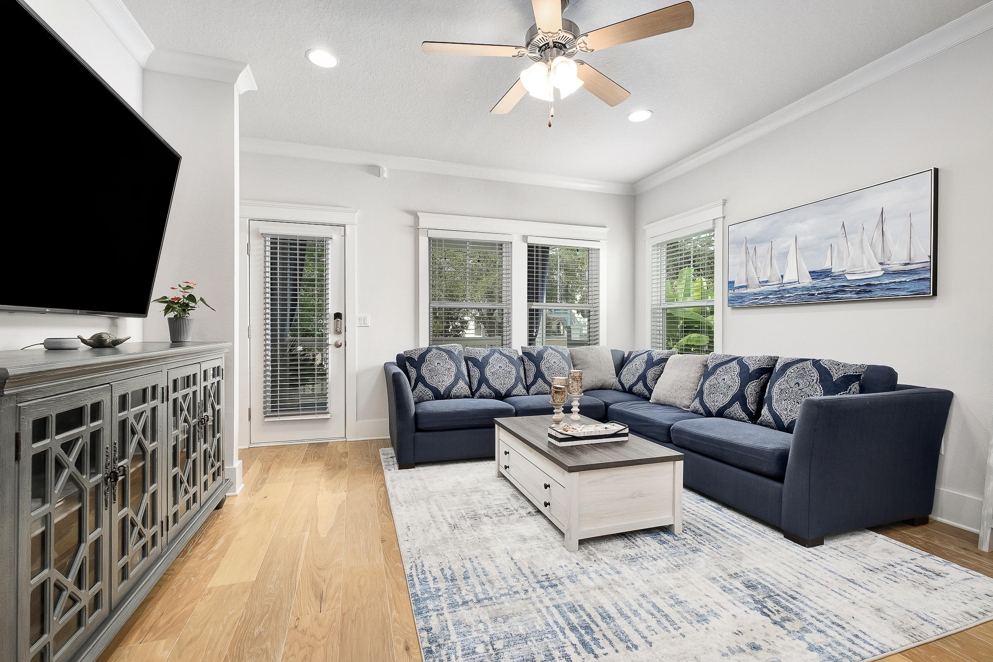 386 Grande Pointe Circle Inlet Beach, FL 32461 - Photo 12 of 50 a living room with furniture and a flat screen tv