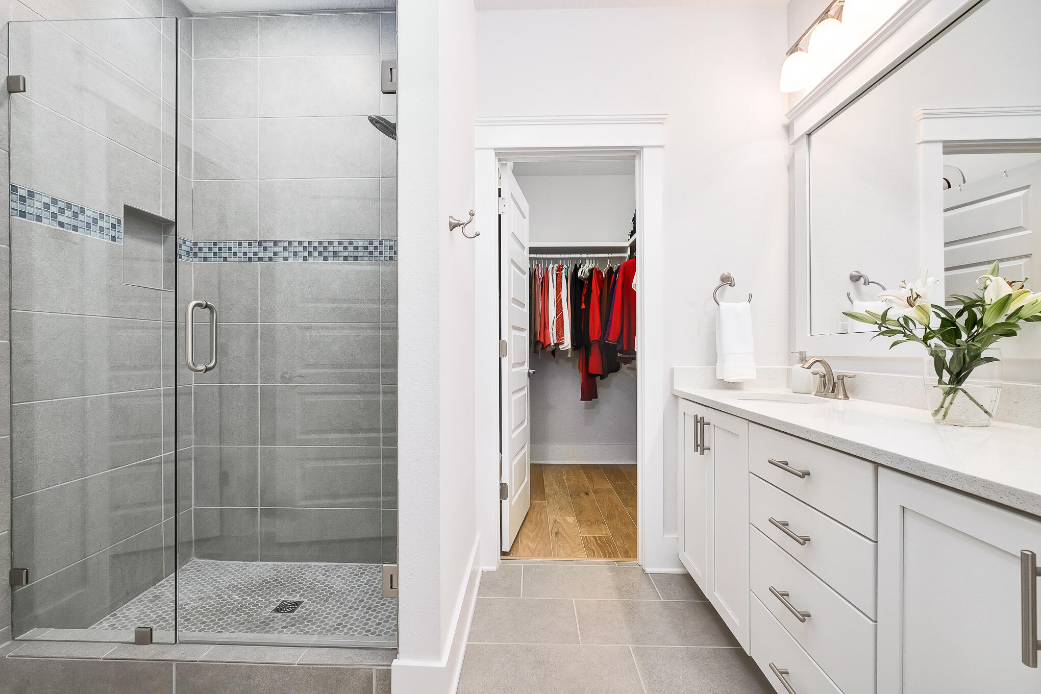 386 Grande Pointe Circle Inlet Beach, FL 32461 - Photo 17 of 50 a bathroom with a shower sink and mirror