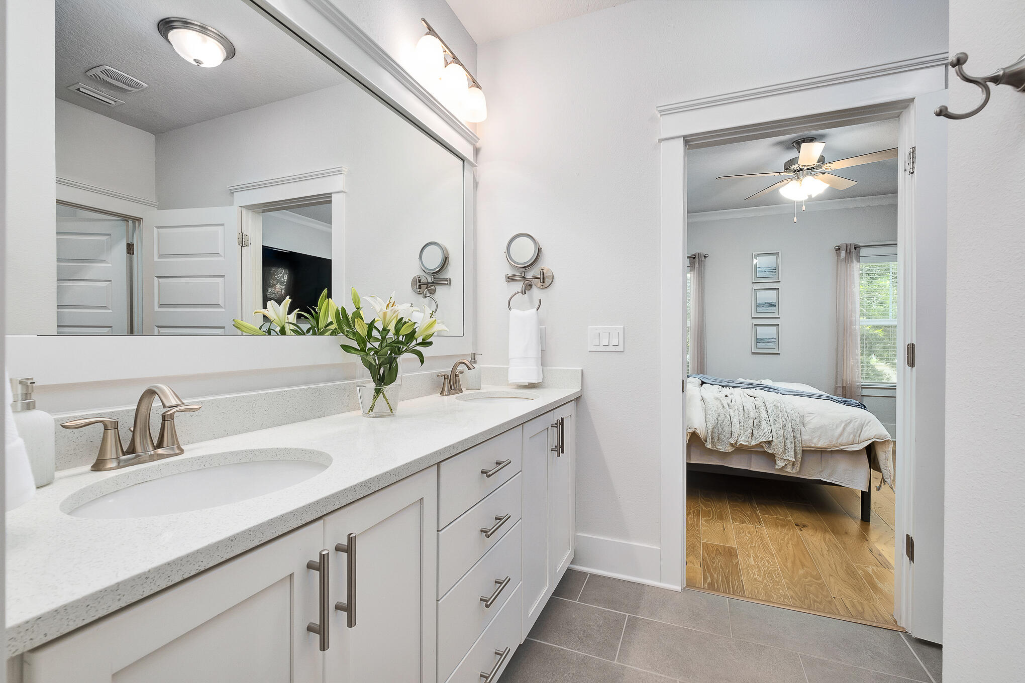 386 Grande Pointe Circle Inlet Beach, FL 32461 - Photo 19 of 50 a en suite bathroom with a granite countertop sink and a mirror