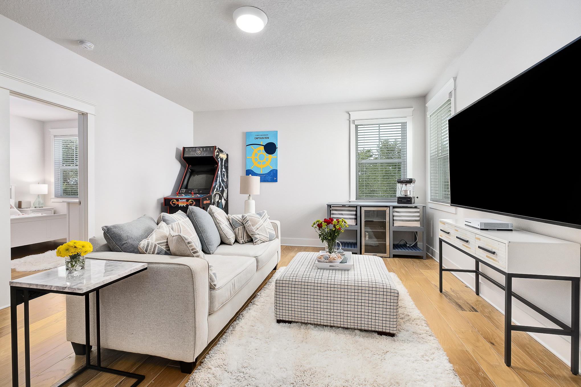 386 Grande Pointe Circle Inlet Beach, FL 32461 - Photo 20 of 50 a living room with furniture and a flat screen tv