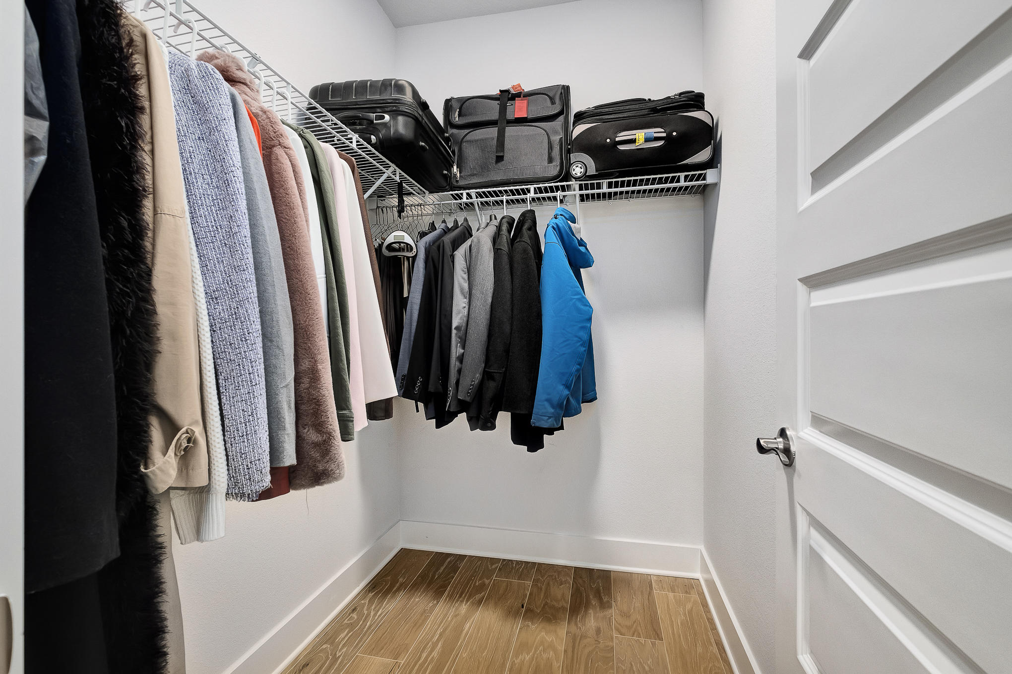 386 Grande Pointe Circle Inlet Beach, FL 32461 - Photo 23 of 50 a view of walk in closet with clothes and shoes