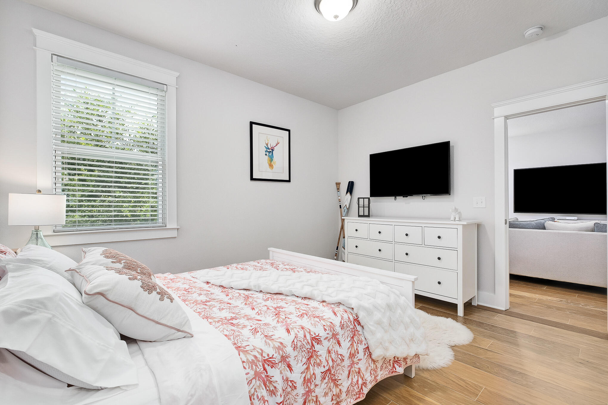 386 Grande Pointe Circle Inlet Beach, FL 32461 - Photo 24 of 50 a bedroom with a bed and a flat screen tv