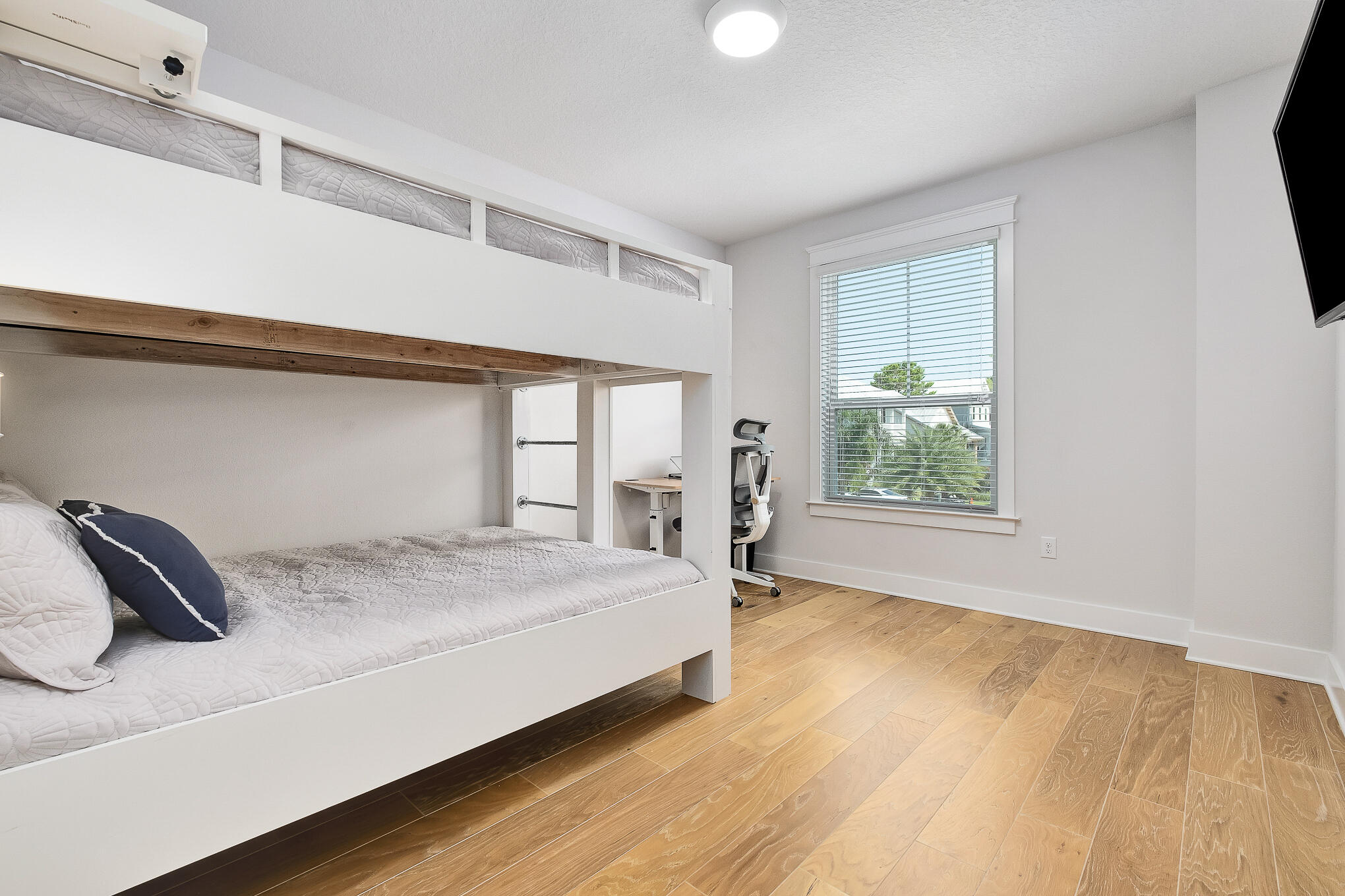 386 Grande Pointe Circle Inlet Beach, FL 32461 - Photo 26 of 50 a bedroom with a bed and a window