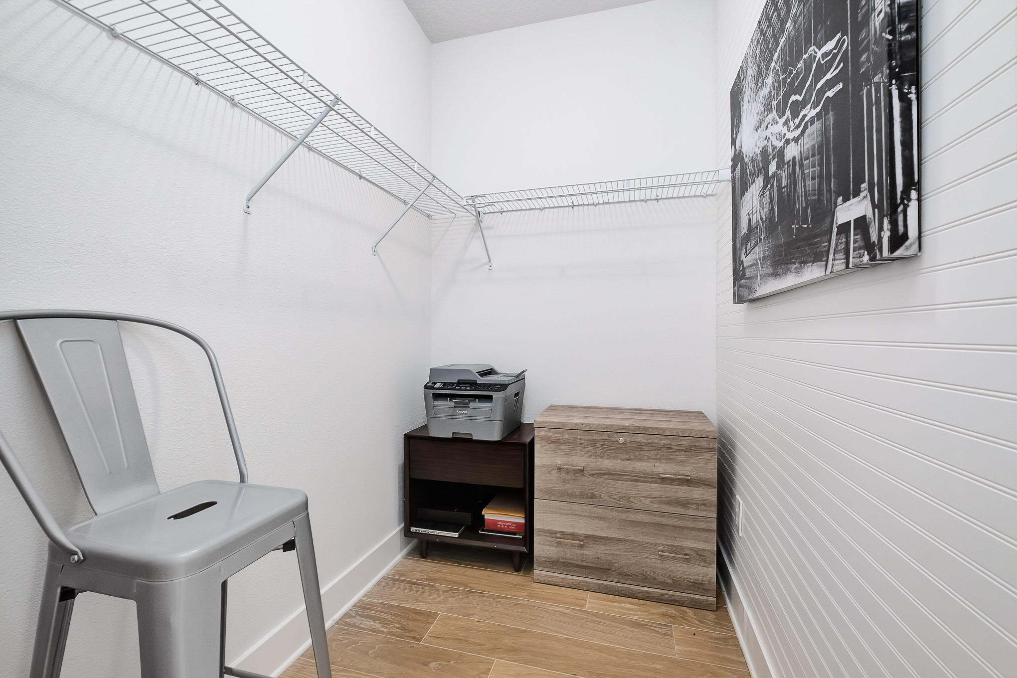 386 Grande Pointe Circle Inlet Beach, FL 32461 - Photo 27 of 50 a view of walk in closet with clothes and shoes
