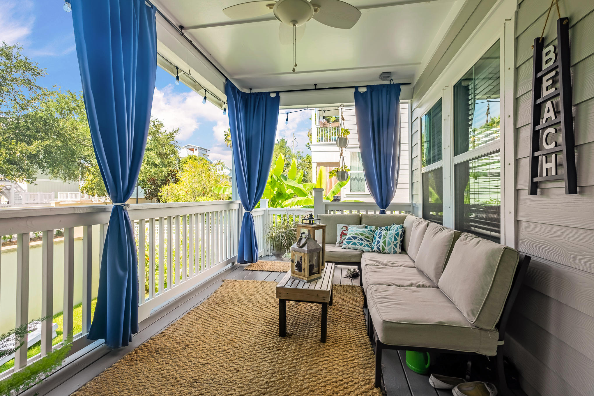 386 Grande Pointe Circle Inlet Beach, FL 32461 - Photo 32 of 50 a living room with furniture and a large window