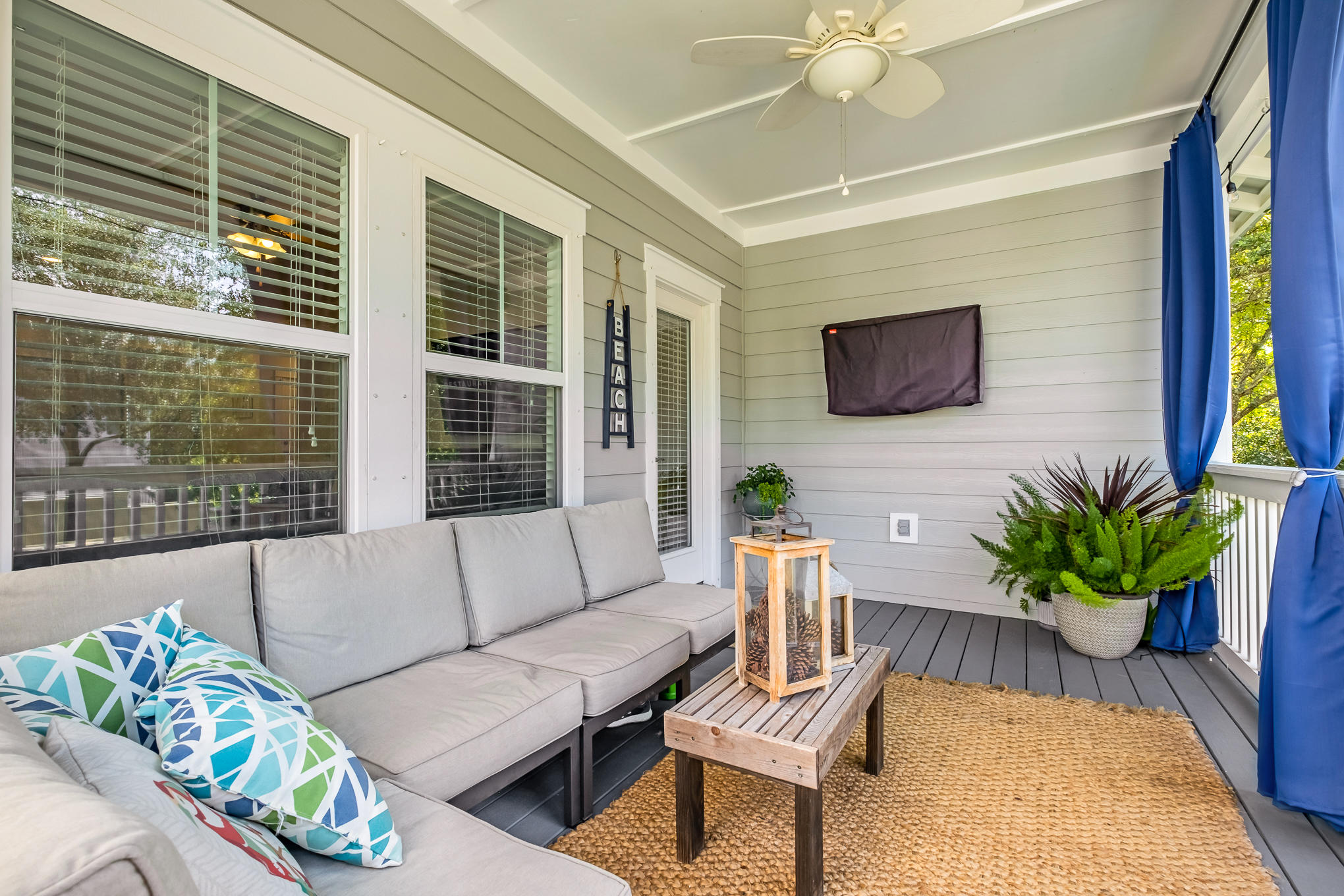 386 Grande Pointe Circle Inlet Beach, FL 32461 - Photo 33 of 50 a living room with patio furniture and a potted plant
