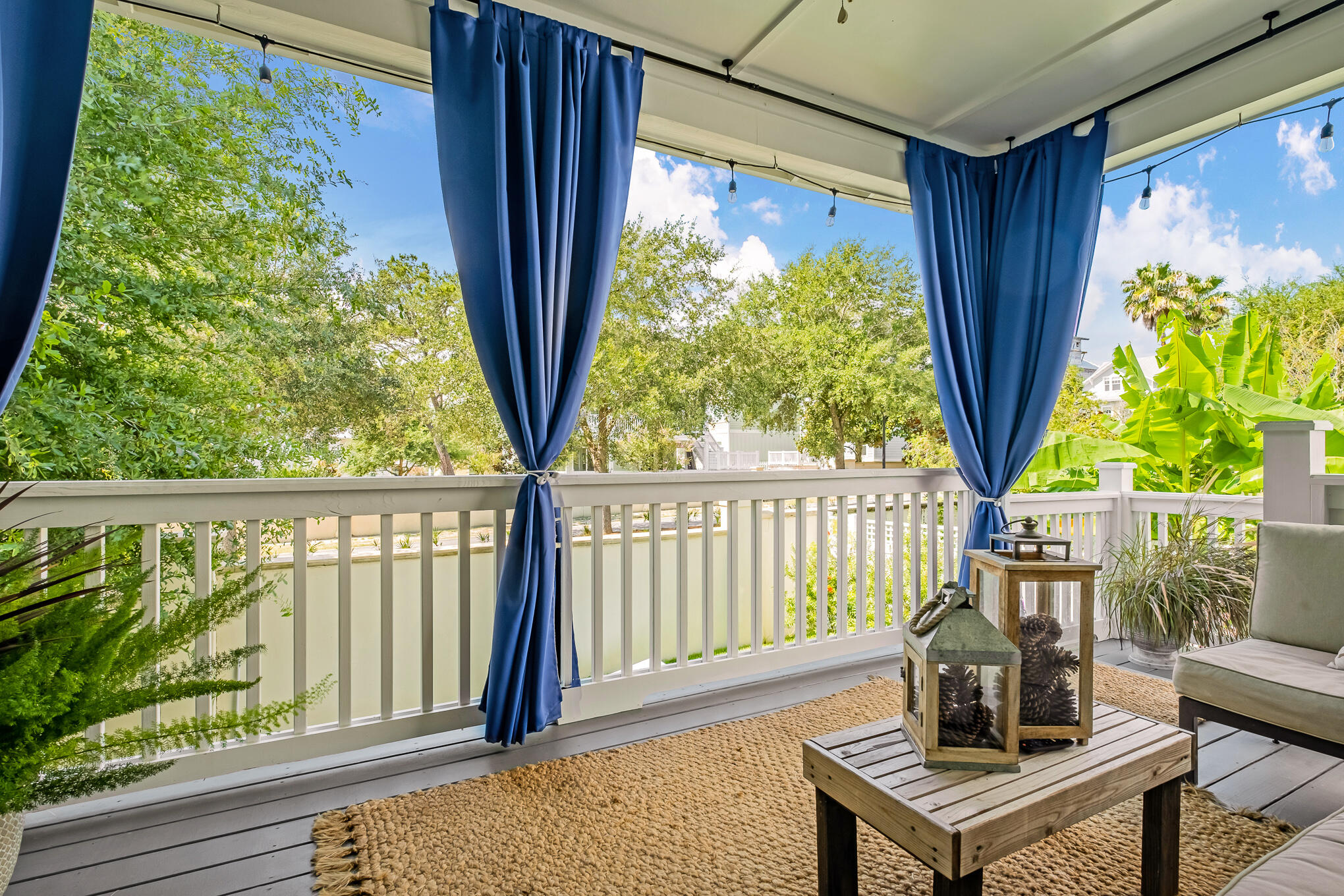 386 Grande Pointe Circle Inlet Beach, FL 32461 - Photo 34 of 50 a view of a chairs and table in a balcony