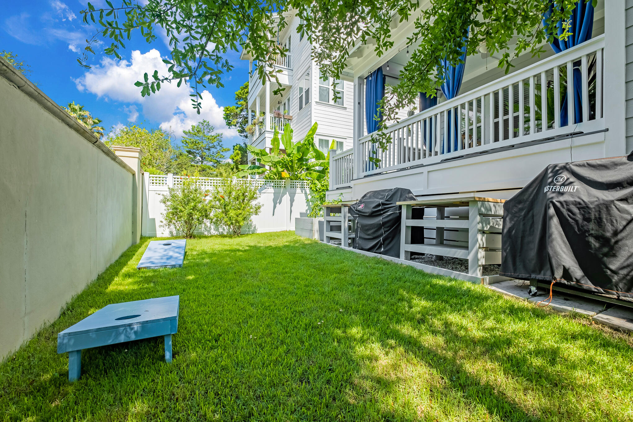 386 Grande Pointe Circle Inlet Beach, FL 32461 - Photo 37 of 50 a view of a house with backyard and sitting area