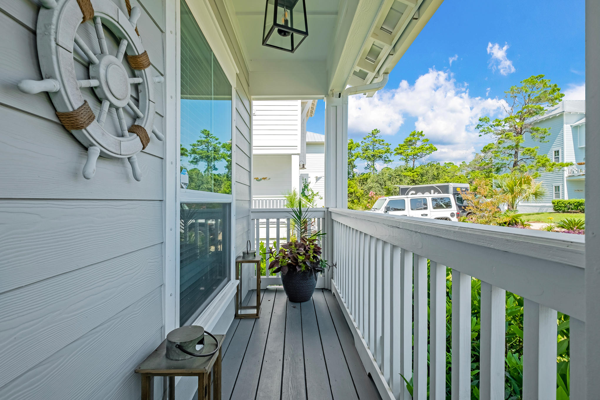 386 Grande Pointe Circle Inlet Beach, FL 32461 - Photo 39 of 50 a view of a balcony with wooden floor