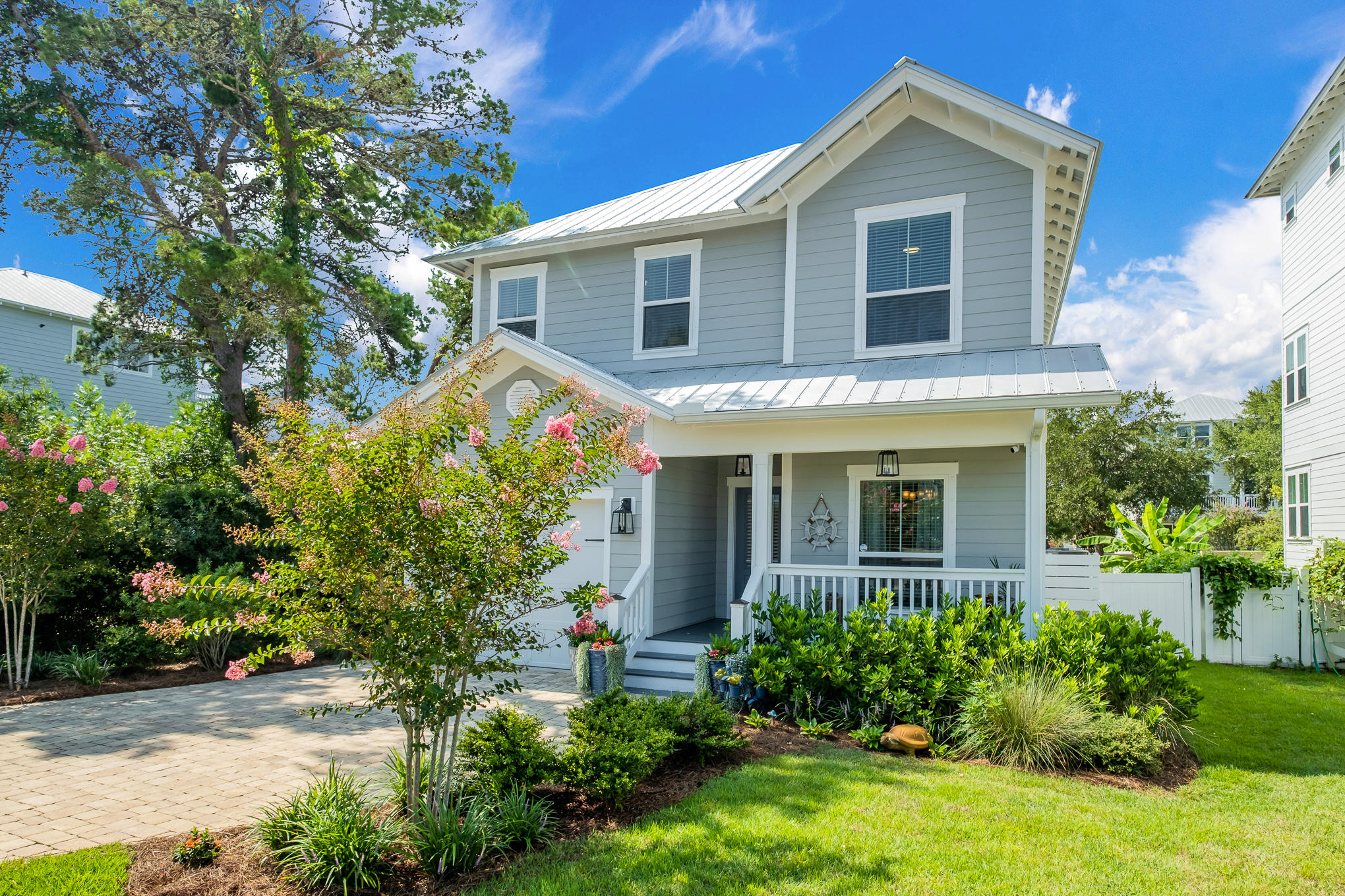 386 Grande Pointe Circle Inlet Beach, FL 32461 - Photo 40 of 50 a front view of a house with a yard