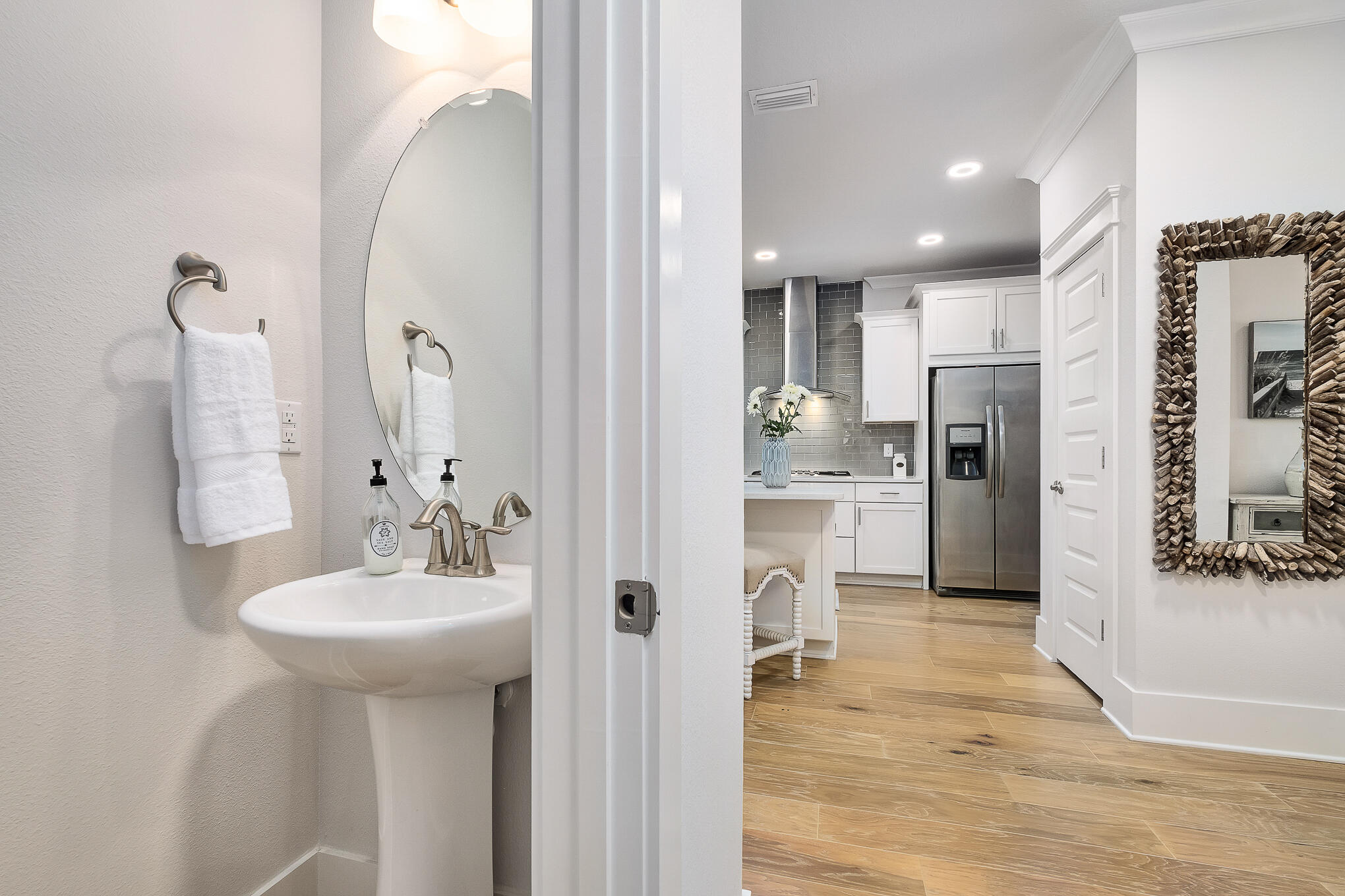 386 Grande Pointe Circle Inlet Beach, FL 32461 - Photo 5 of 50 a bathroom with a sink double vanity and a mirror