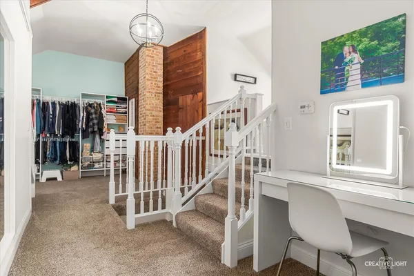 a view of entryway with livingroom